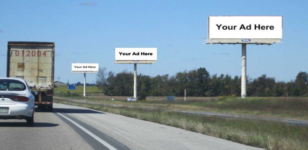 Billboard ads on the side of the highway